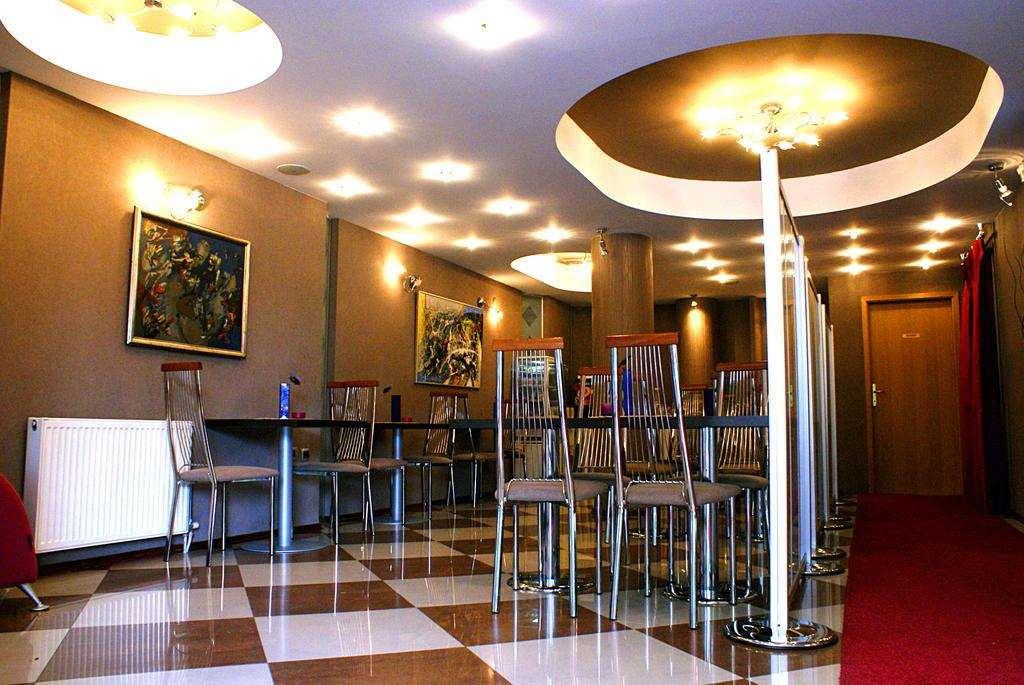 סקופיה Leonardo Hotel מסעדה תמונה
