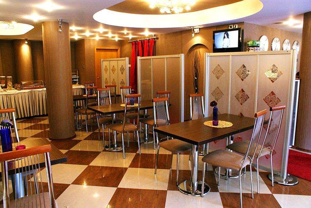 סקופיה Leonardo Hotel מסעדה תמונה